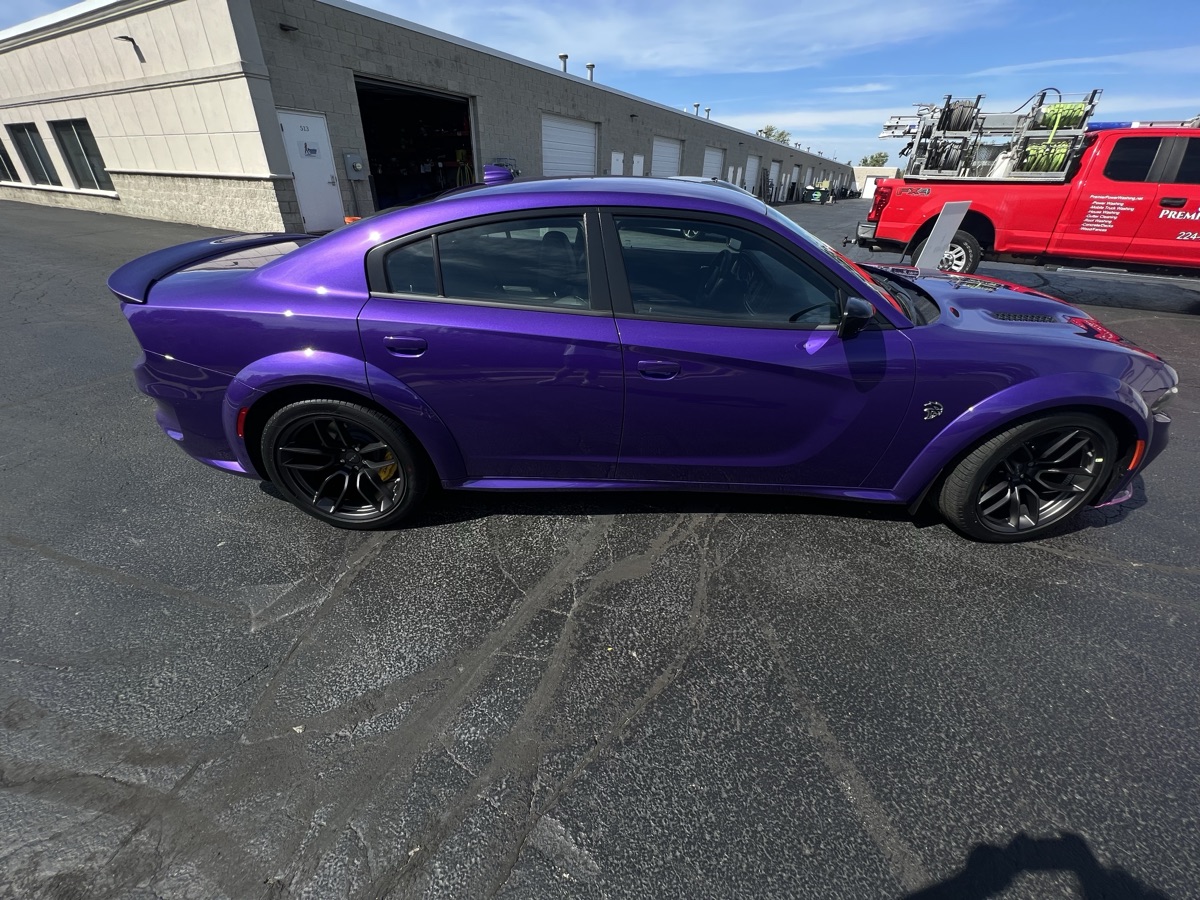 Purple Dodge Charger SRT side profile after detail